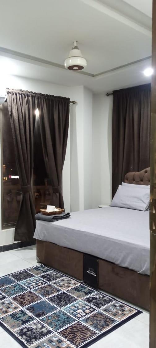 Northern Suites Bahria Town 拉瓦尔品第 客房 照片